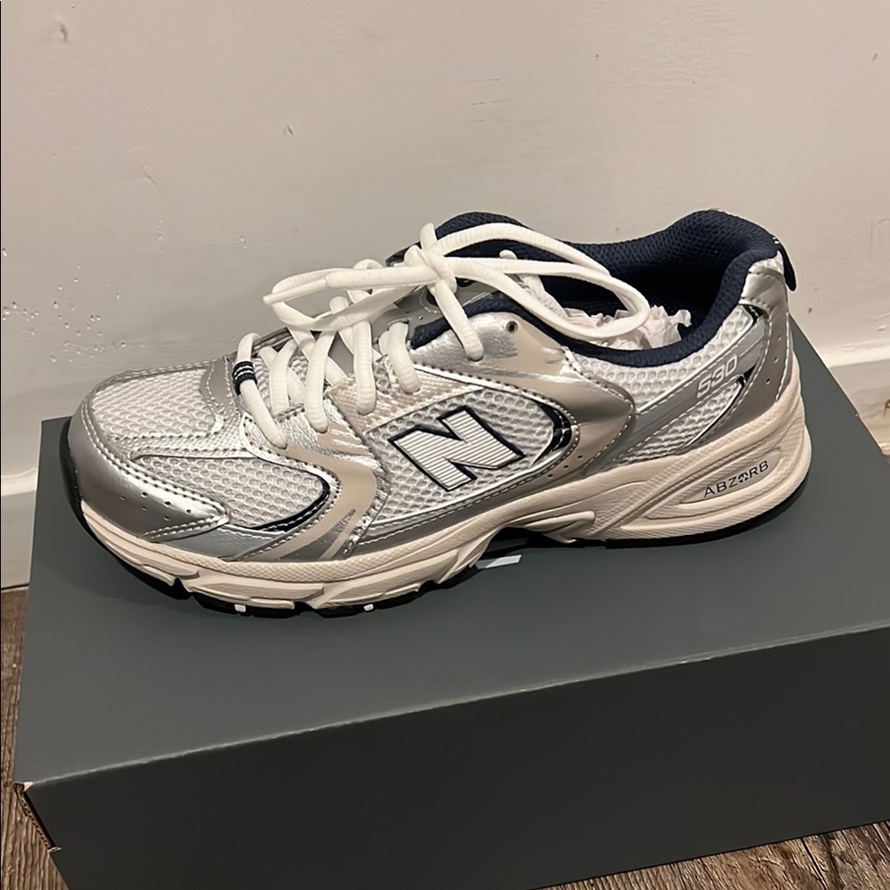 New Balance Silver and White Sneakers